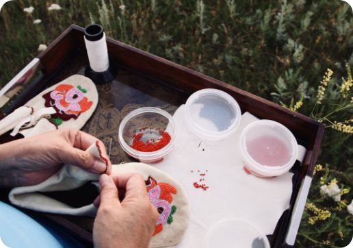 a community craft woman doing craftwork